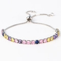 Detailed macro shot of silver adjustable bracelet featuring multicolor round zircons - Adjustable Drawstring / Rainbow Silver