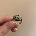 Detailed close-up of oval spotted stone inlay on a silver adjustable open ring - Silver Dalmatian Stone Ring / Adjustable Open