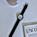 Minimalist quartz watch with black silicone strap and luminous green numerals on white dial - Small Size - Half Numeric Luminous White Dial