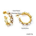 Detail view of gold-plated C-shaped stainless steel earrings with pearls and crystals - Gold Pearl Rhinestone Style