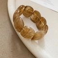 Detail of amber acrylic chain bracelet with marble texture on minimalist display stand - 85# Bracelet (Spliced Round) / Light Brown Tie-dye