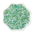 Green 4mm round cat-eye glass seed beads for DIY jewelry making in a petal bowl - Vibrant Greenery