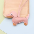 Detail of pink leather dachshund bag charm with fine stitching and soft texture - Dachshund / Pink