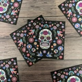 Square napkins featuring colorful Mexican Day of the Dead sugar skull and flower patterns - Flower Skull