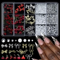 Close-up of 15-grid nail art set featuring 3D resin bows and red cherry charms - 15 Grids Mix 03 (Red Cherry & Metal Bow)