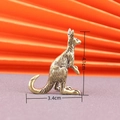 Vintage brass kangaroo figurine 4.1cm high for desk decor on orange background - Kangaroo
