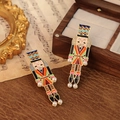 Nutcracker soldier stud earrings with colorful oil drip finish and white faux pearls - Orange Black Green Blue