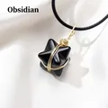 Handcrafted obsidian Merkaba star pendant with gold wire wrap on black cord - Obsidian