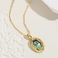 Golden necklace with oval abalone shell pendant and irregular metal edge detail - Oval Necklace 14K Gold