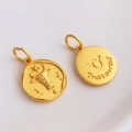 Golden Taurus zodiac charm pendant with bull relief and Trustworthy engraving - Taurus - H-11205