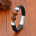 Bracciale classico in pelle intrecciata con pietre occhio di tigre e chiusura magnetica - 21cm / Argento