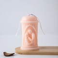 Handmade pink pillar candle with couple relief carving and Best Wishes ribbon - Face Touching (Light Pink)