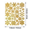 Detailansicht goldener Glitzer-Schneeflockenaufkleber mit Größenangaben - Gold
