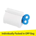 Manual rolling tube toothpaste squeezer with white base and blue rotating handle - OPP Bag / Blue