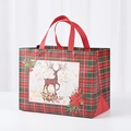 Plaid Christmas gift bag featuring red reindeer design and Merry Christmas greeting - Elk