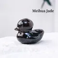 Plum blossom jade duck figurine with polished black and reddish-brown mineral spots - Plum Blossom Jade
