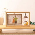 6-inch rotating wooden double-frame with warm LED home bulb and cute resin figurine - Double Sided Horizontal - Moon Boy