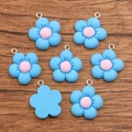Colgantes de flores de resina azul con centro rosa para crear bisutería y manualidades - Azul