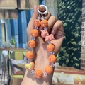 DIY acrylic keychain with orange beads, pink resin unicorn, and iridescent heart charm - Orange Unicorn
