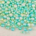 Mix of colorful gradient ABS imitation pearls scattered on a soft white plush background - No Hole / 4/6/8/10mm Mixed, approx 250 Pieces / Blue Light Green