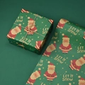Green Christmas kraft wrapping paper featuring Santa Claus and Let It Snow text on gift box - Smiling Santa Claus