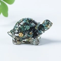 Clear resin turtle ornament featuring teal and black crystals with gold leaf flakes - 42 Raw Turquoise + Gold Foil