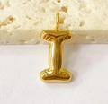 Macro shot of gold bubble initial letter I pendant on a textured stone surface - Letter-I / Steel