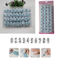 Macro detail of 36-piece plastic alphabet and number cookie cutters with spring plungers - Uppercase & Numbers Set