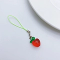 Cute resin red apple phone strap with green leaf and lanyard on a white background - Apple