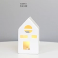 Detail view of white ceramic house LED night light with 7x6x12CM dimensions and window cutouts - RH2250 (7x6x12cm)