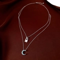 Double-layer silver necklace featuring a square lock and crescent moon with blue stones - Silver