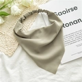 Close-up of light green chiffon hair scarf with elastic band on white texture - Light Green