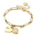 Bracelet trombone en acier doré avec deux breloques en cœur et fermoir homard - Doré