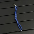 Macro view of blue woven paracord keychain with reflective strips and metal hook - Dark Blue