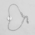 Silver chain bracelet featuring a round cutout pendant with the letter T and lobster clasp - Silver T