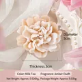 Handmade carnation soy wax candle in milk tea color with amber oud scent, 5cm size - Milk Tea (Amber Oud)