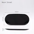 Small black oval organizer tray measuring 18cm by 8.5cm with minimalist design - Small / Black