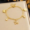 Bracciale in acciaio dorato con ciondoli a forma di girasole, farfalla e goccia - Stile Ciondolo Farfalla Girasole Dorato (B2011)