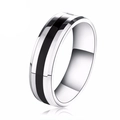 Polished titanium steel ring with black enamel inlay shown on a clean white background - US 5 / 6 mm