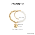 Detail view of steel chain and plastic pearls bracelet with heart mother-daughter charm - Mother-Child Silhouette Style (KB203701-Z)