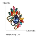 Fashion crystal glass brooch with large blue pear rhinestone and vintage gold finish - Colorful