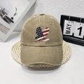 Detail of vintage eagle embroidery with American flag motif on washed khaki baseball cap - One Size / Khaki