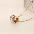 Close-up of rose gold Roman numeral pendant with paved zircons on a delicate snake chain - Roman Numeral Cylindrical Style (KN237971-GC) / Rose Gold