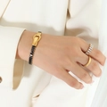 Gold-plated titanium steel bracelet featuring black zircon stones and magnetic buckle - Gold Black Zirconia