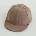 Detail view of khaki cotton short brim baseball cap with soft top and breathable eyelets - 52cm (2-6 Years) / Khaki