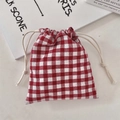 Detail of red and white checkered drawstring bag in cotton linen for jewelry storage - Red Gingham Seersucker (Small)