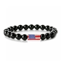 Detail of black agate beaded bracelet featuring a rectangular American flag charm bead - Polished Stone Long