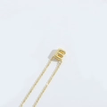 Minimalist gold clavicle necklace featuring a 3D uppercase letter E pendant on O-chain - Letter E