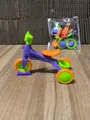 Miniature purple toy tricycle variant with orange wheels and sport logo decoration - Assembly Tricycle / Purple