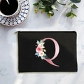 Black canvas cosmetic bag with pink floral letter Q design and secure zipper closure - Letter Q